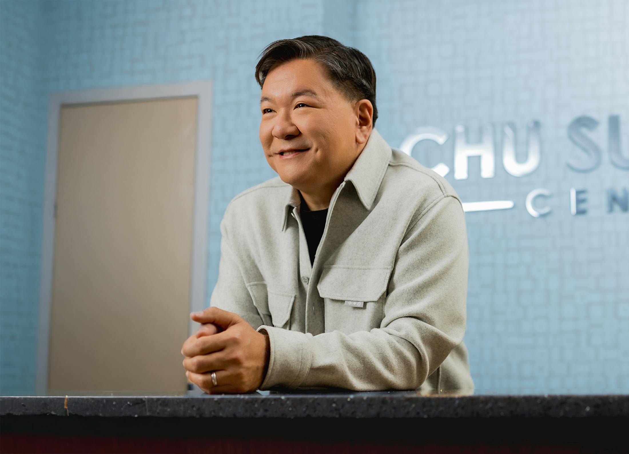 Dr. Chu at front desk