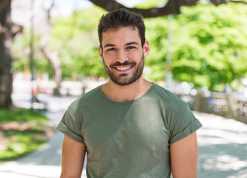 man looking at camera smiling