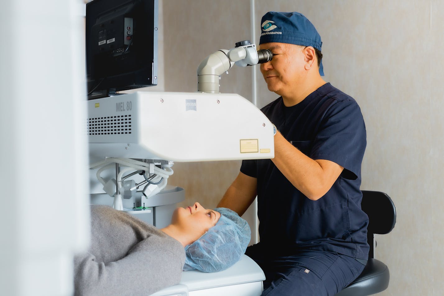 Dr. Chu performing an eye test for a patient