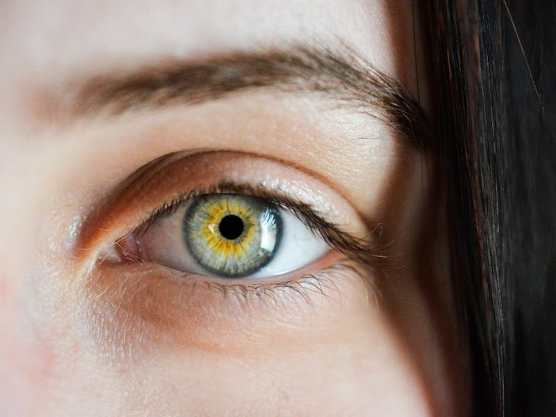 a close up of a woman's left eye