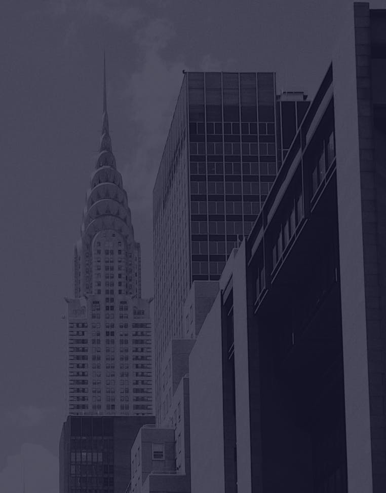 black and white photo of city buildings