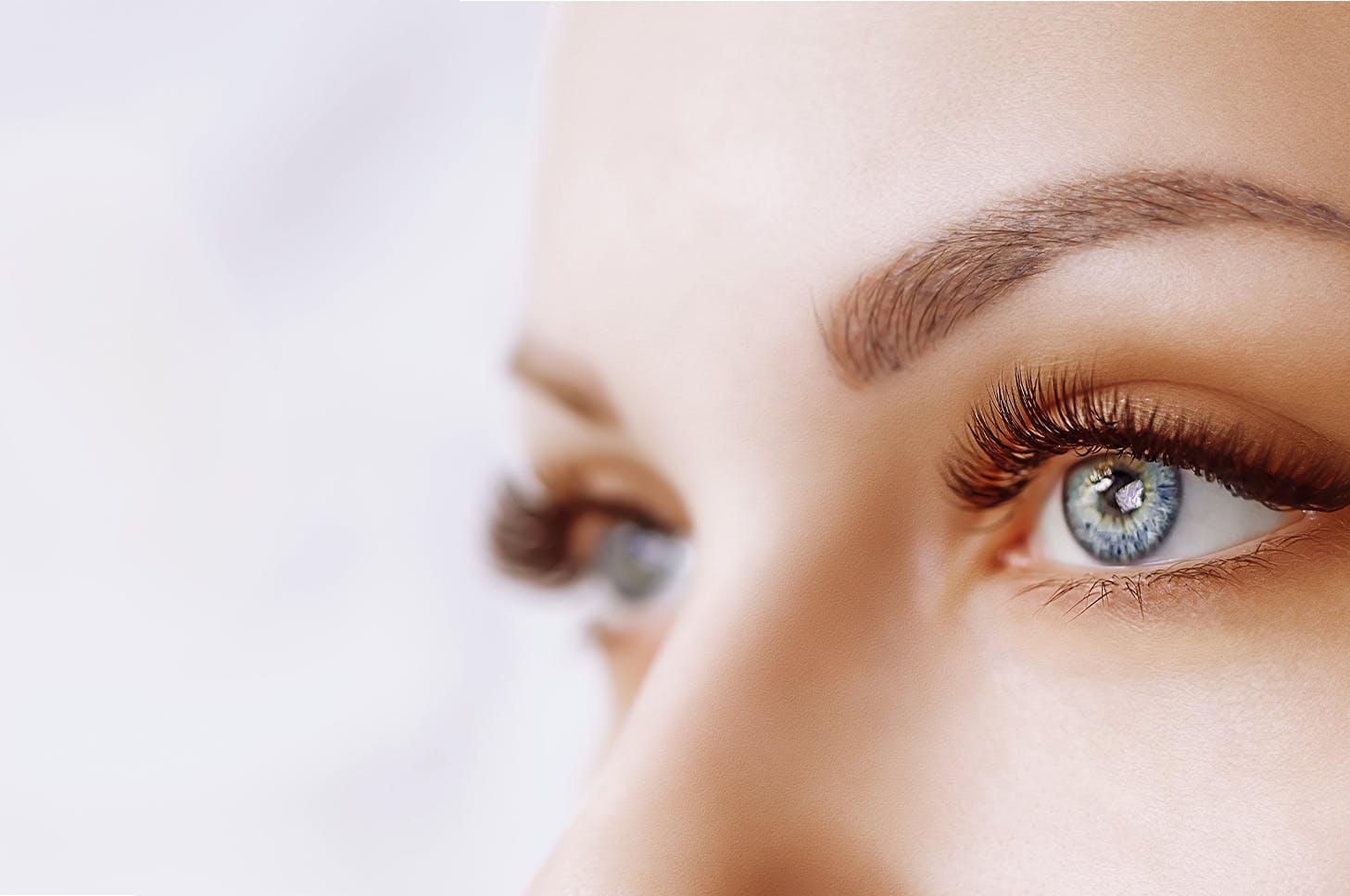 a close up of a woman's eyes