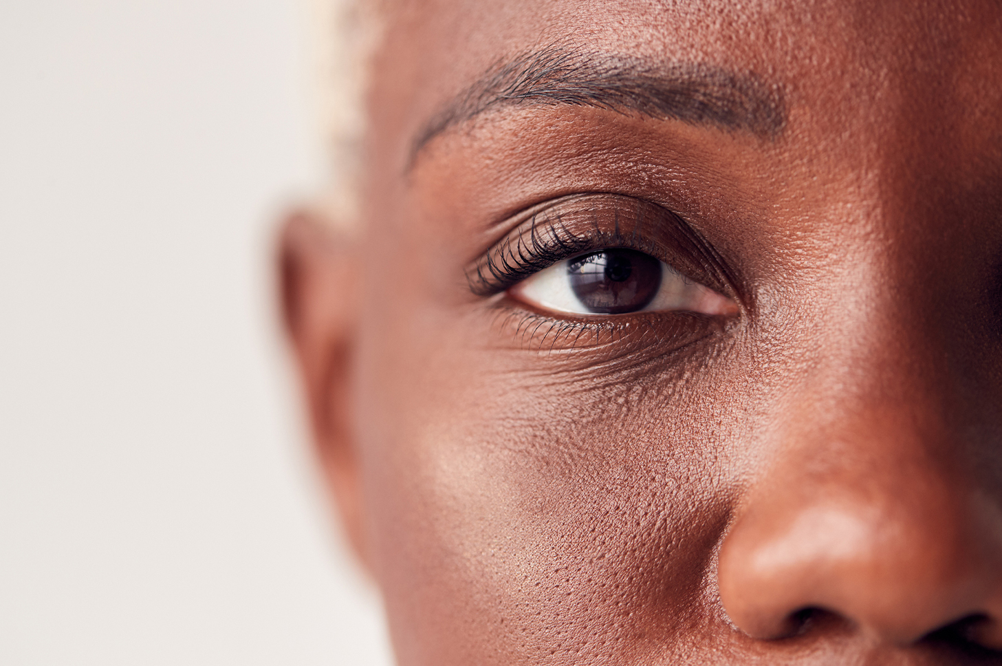 a close up of a woman's right eye