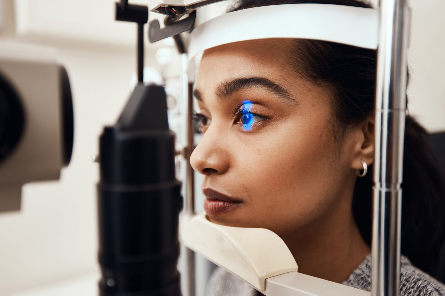 a woman receiving an eye exam