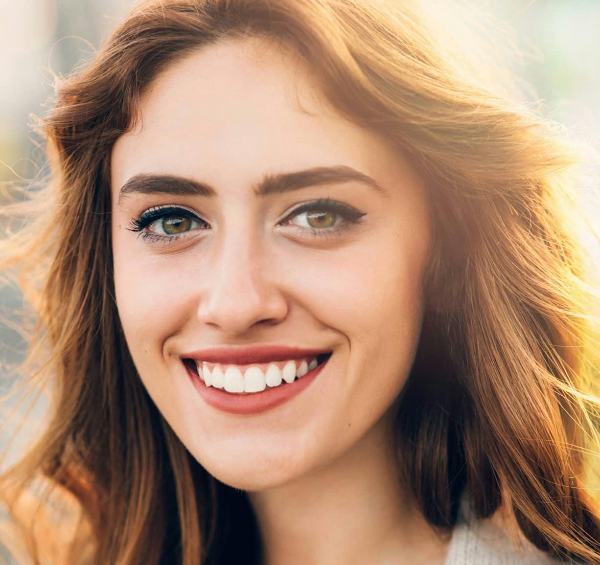 woman smiling and looking into the camera