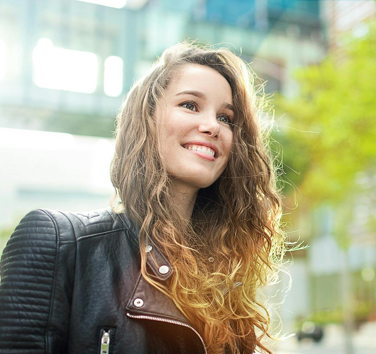 woman smiling looking into the distance