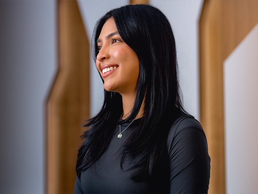 dark haired woman smiling