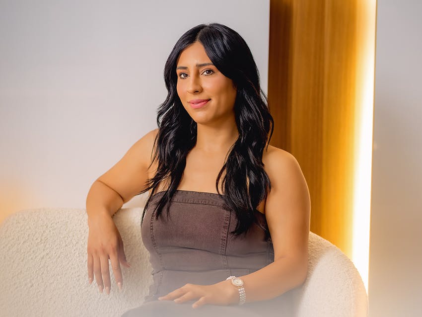 female patient sitting on couch