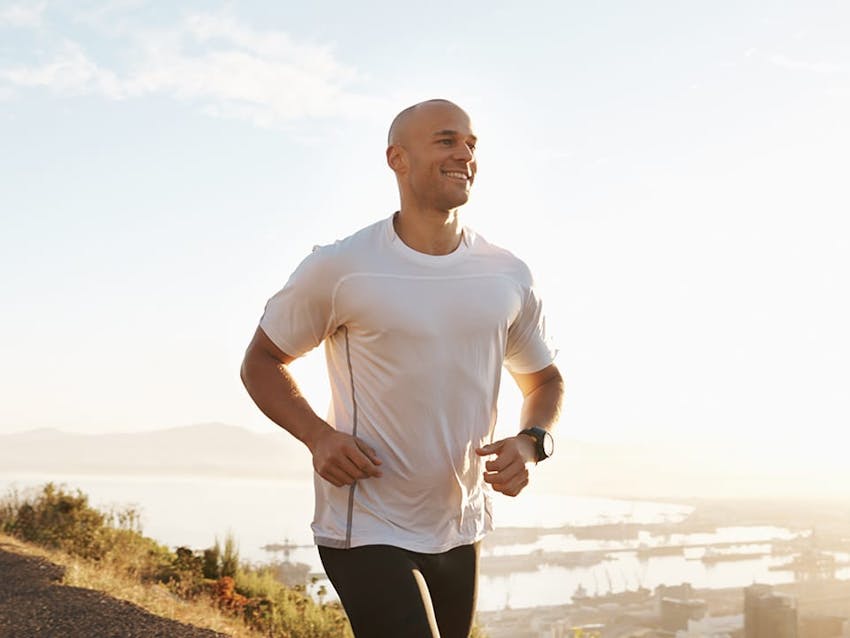 man in white shirt running
