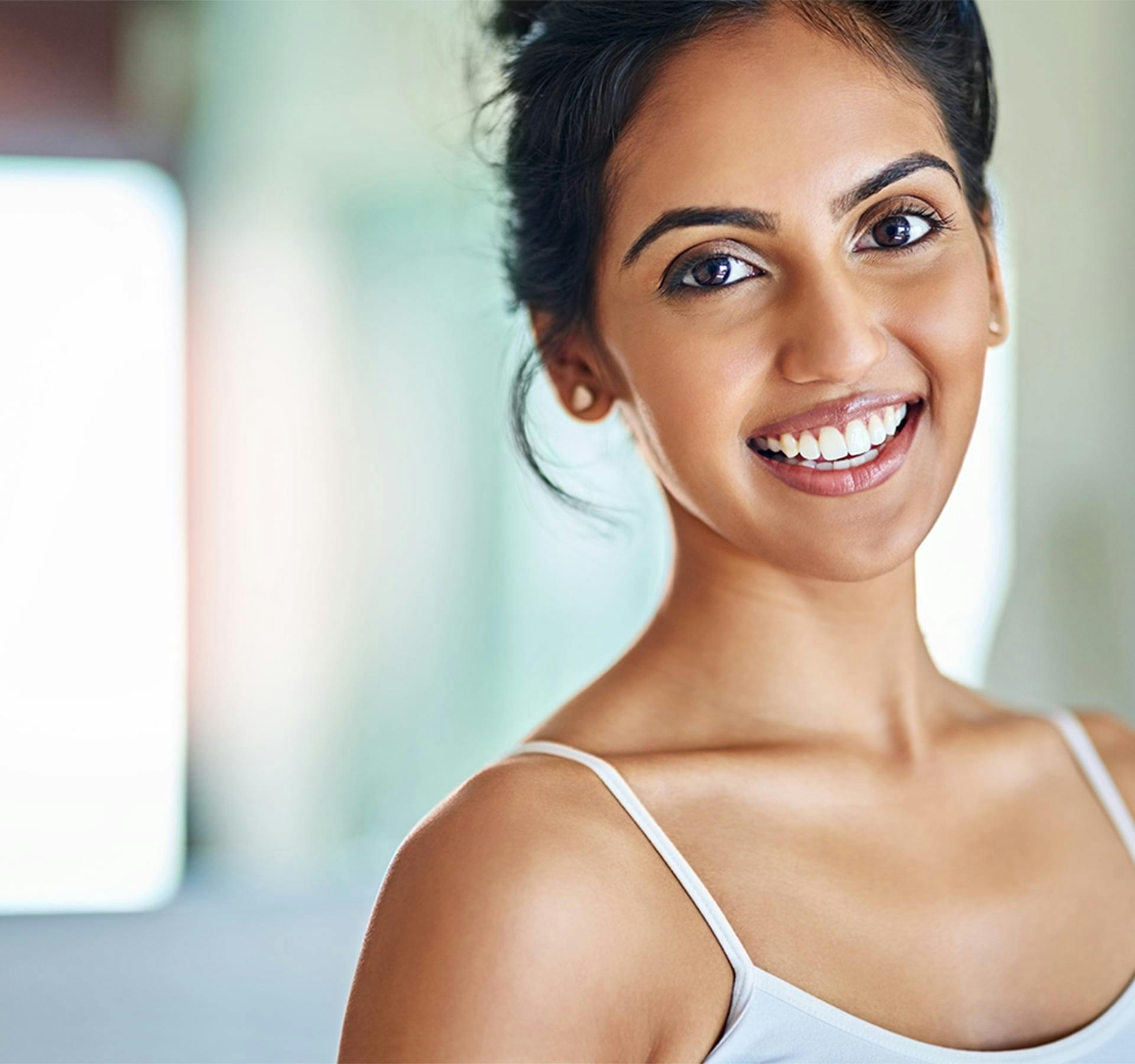 dark haired woman smiling
