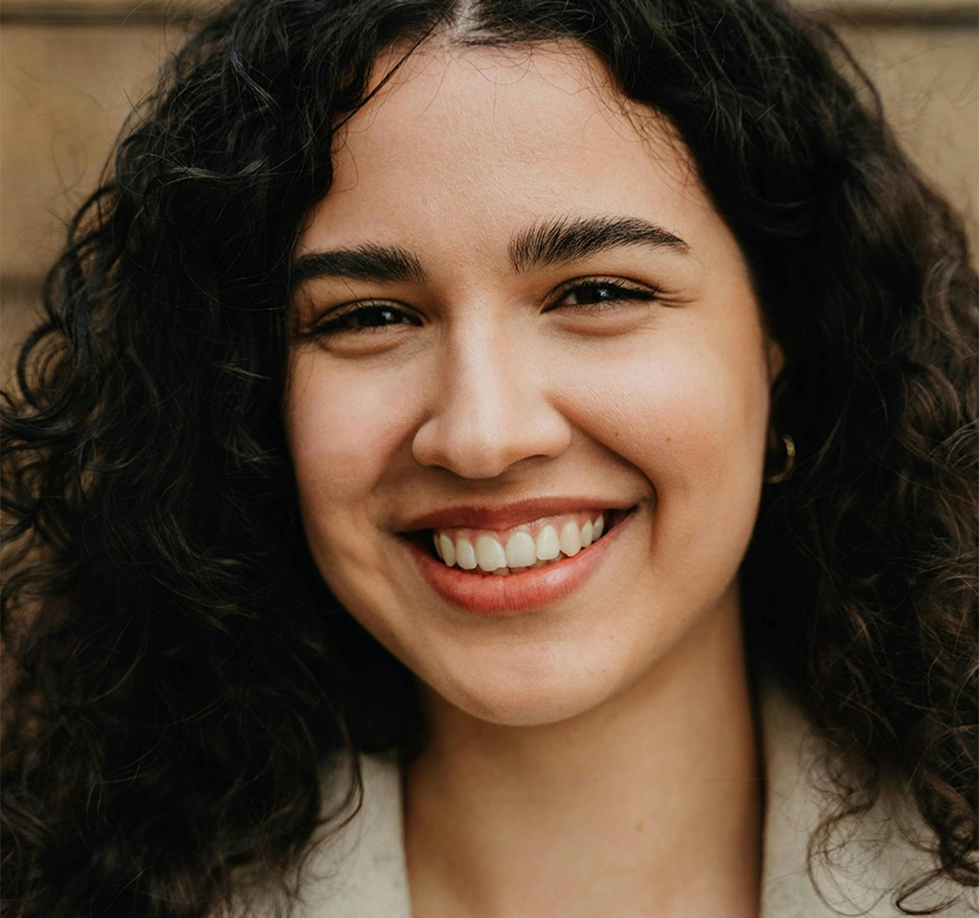 dark haired woman smiling