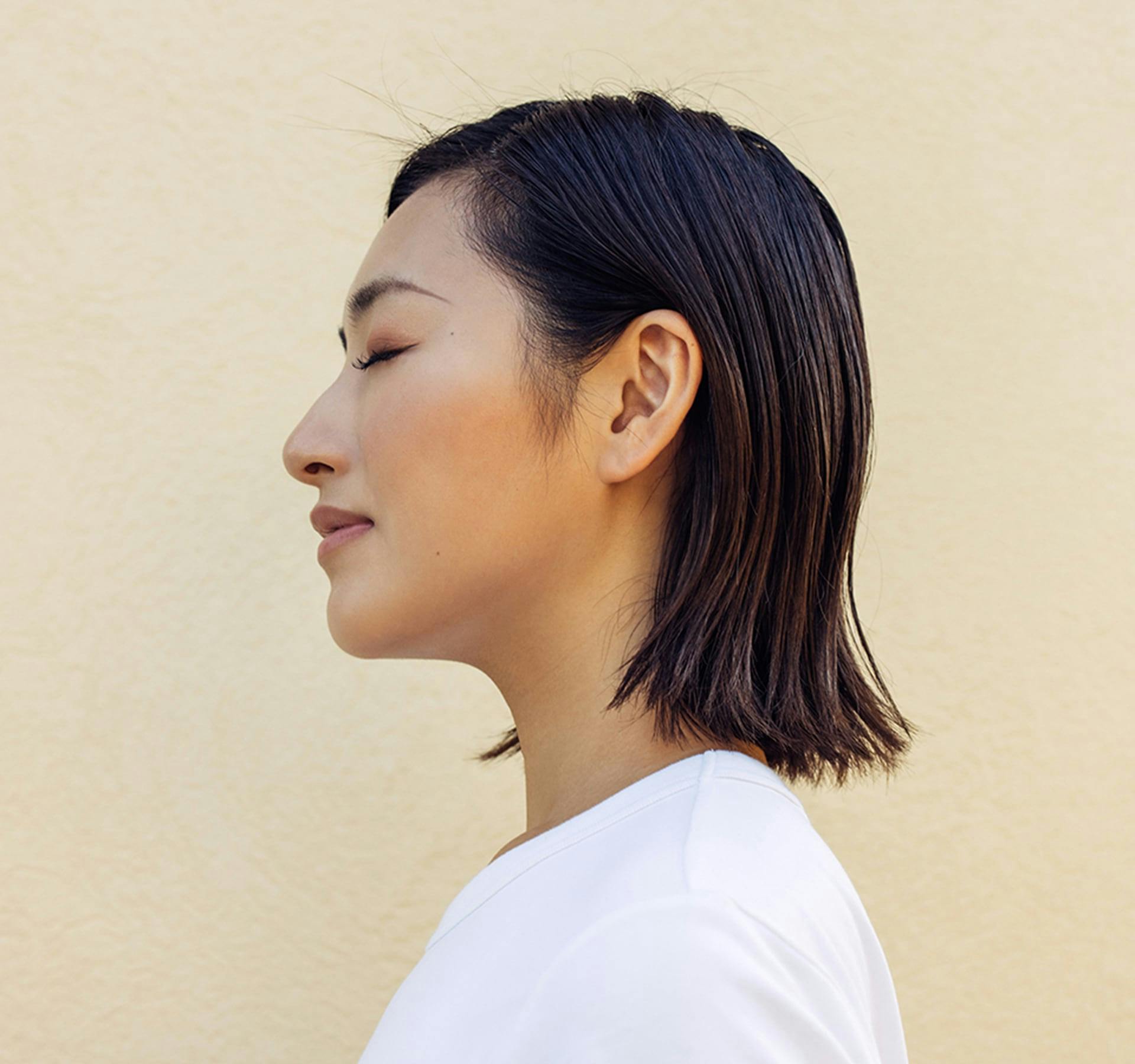 side profile of dark haired woman