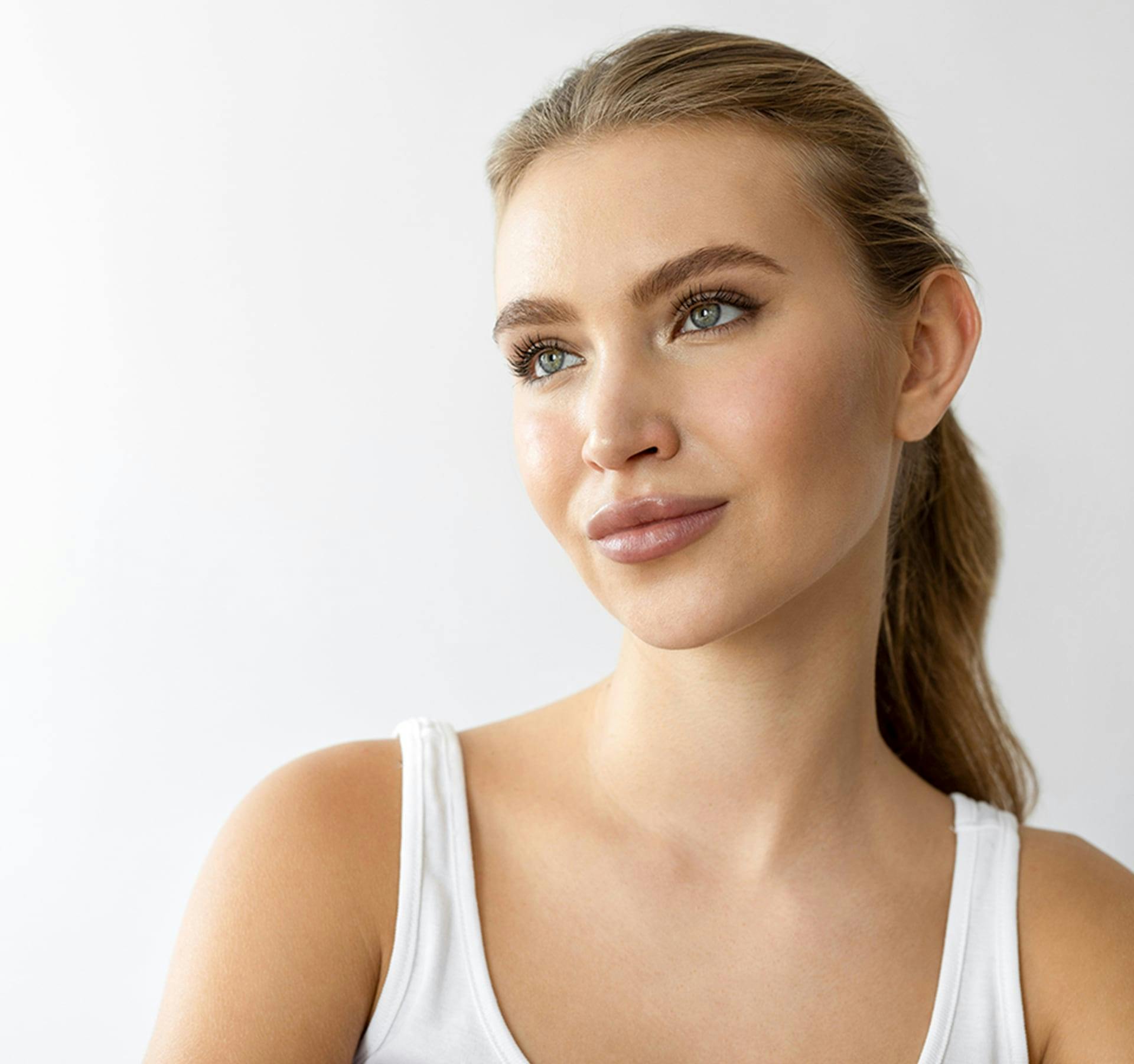 woman smiling with white shirt