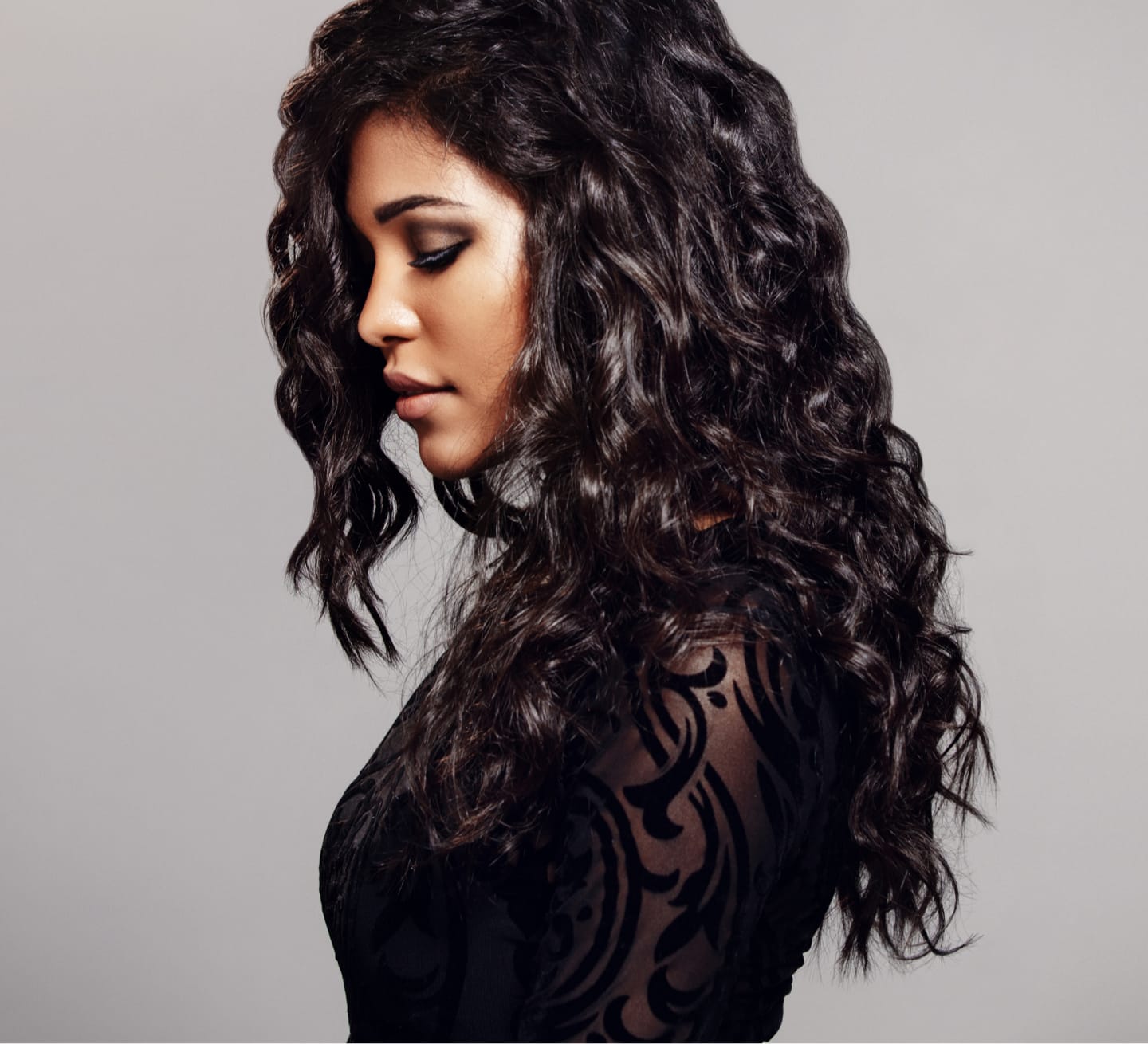 profile of model with wavy hair