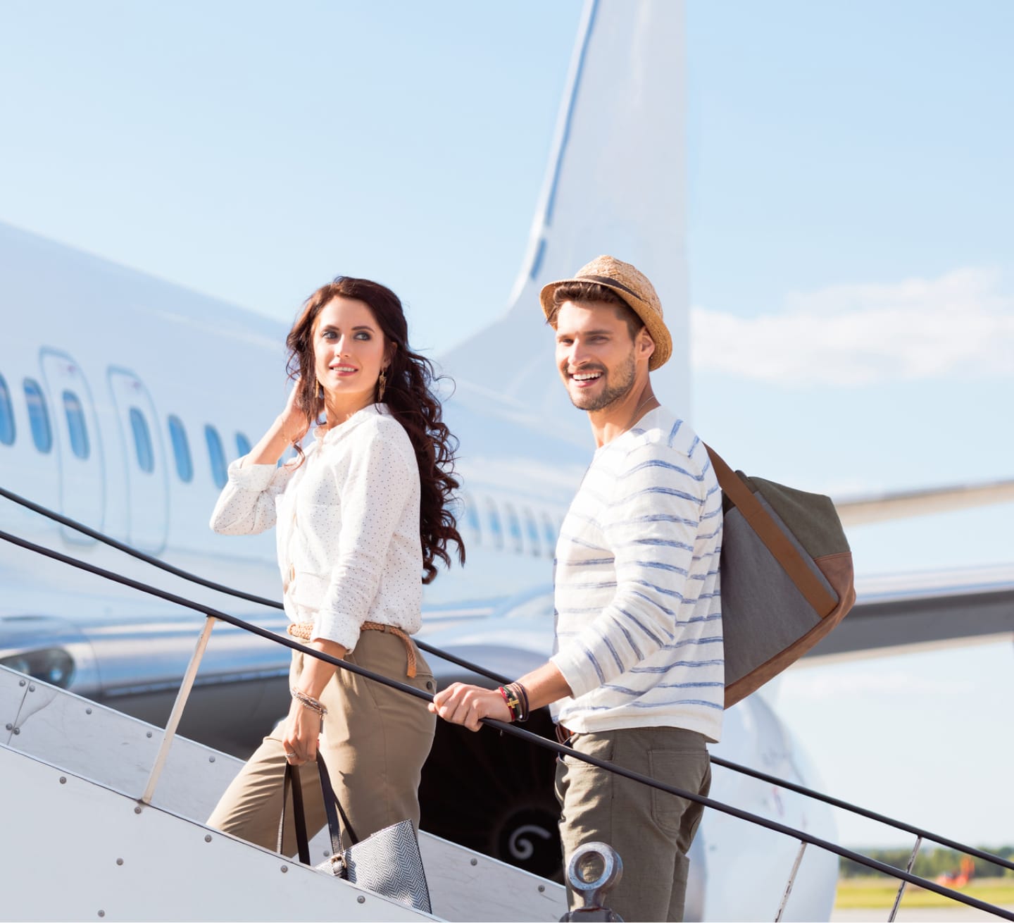 couple boarding plane