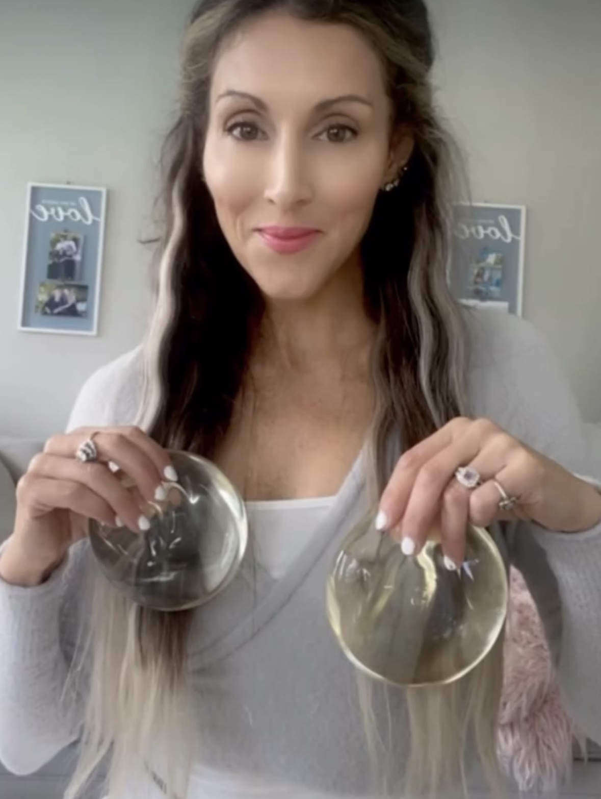 Woman Holding Implants