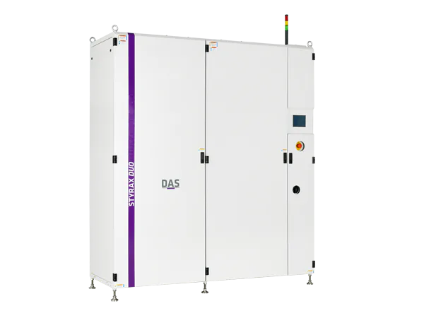 STYRAX DUO System An industrial machine with the words ‘STYRAX DUO’ and ‘DAS’ on the front can be seen, equipped with a digital display, various controls and a small coloured signal system on the top.