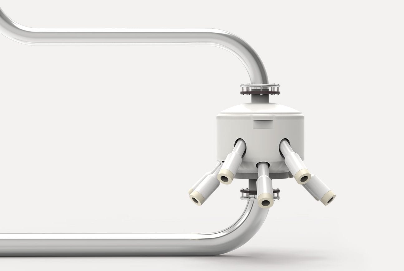 A modern, white industrial piping system with a central, cylindrical valve featuring multiple outlets, set against a plain white background.