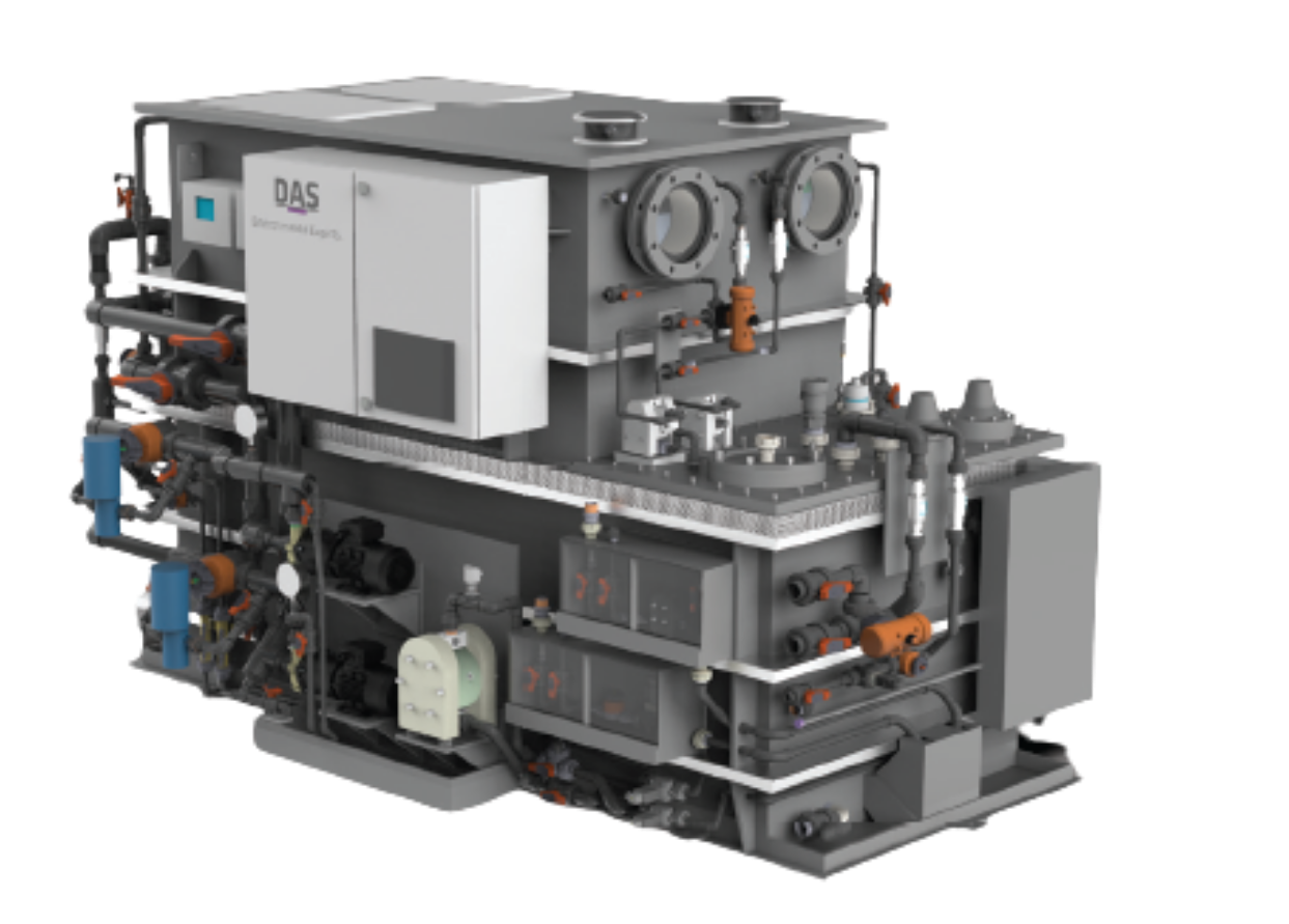 The image shows a complex industrial machinery unit with numerous pipes, valves, and control panels, featuring a metallic structure prominently displaying the letters "DAS," indicative of advanced engineering and industrial process equipment.