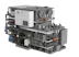 Point-of-Use Product Line The image shows a complex industrial machinery unit with numerous pipes, valves, and control panels, featuring a metallic structure prominently displaying the letters "DAS," indicative of advanced engineering and industrial process equipment.