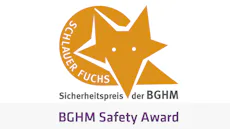 BGHM Safety Award BGHM Safety Award 로고 이미지에는 주황색 여우 모양과 "SCHLAUER FUCHS" 및 "Sicherheitspreis der BGHM"이라는 텍스트가 포함되어 있습니다.