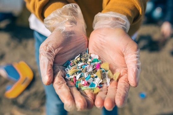 Hands holding plastic