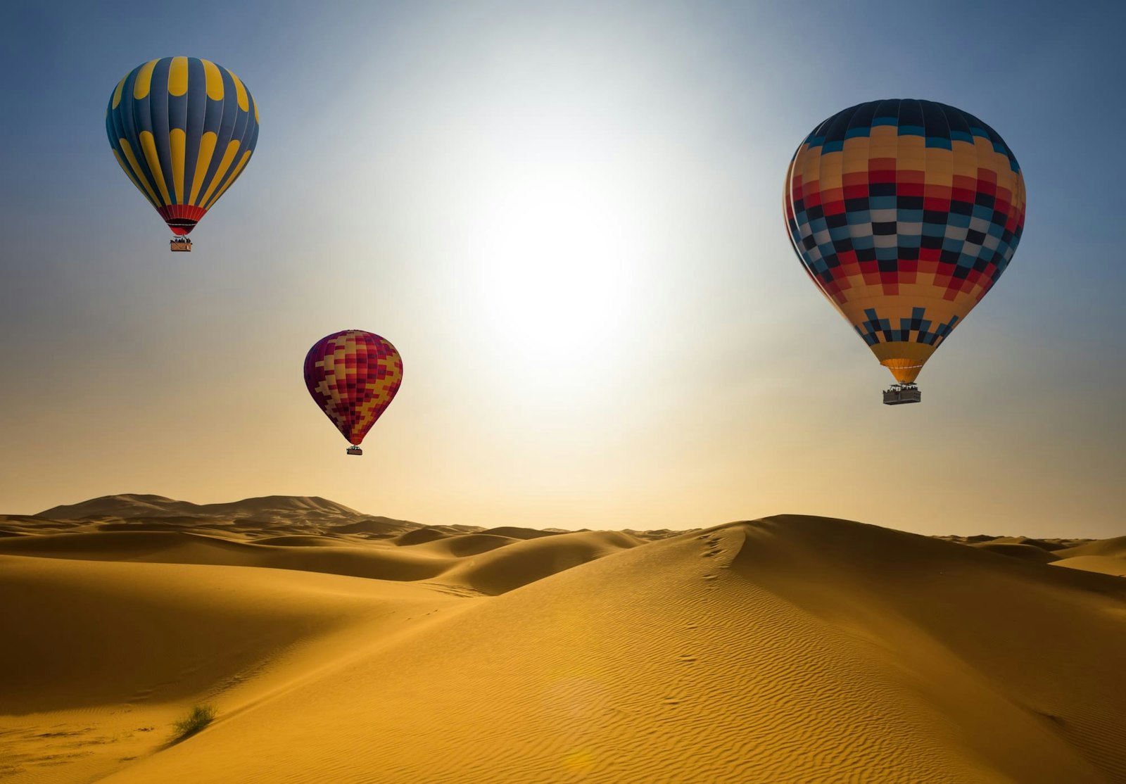 Sunrise hot air balloon ride over the desert