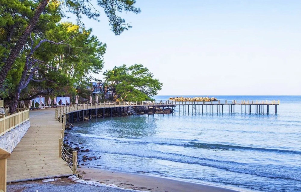 Steg am Strandbereich für Männer im Wome Deluxe