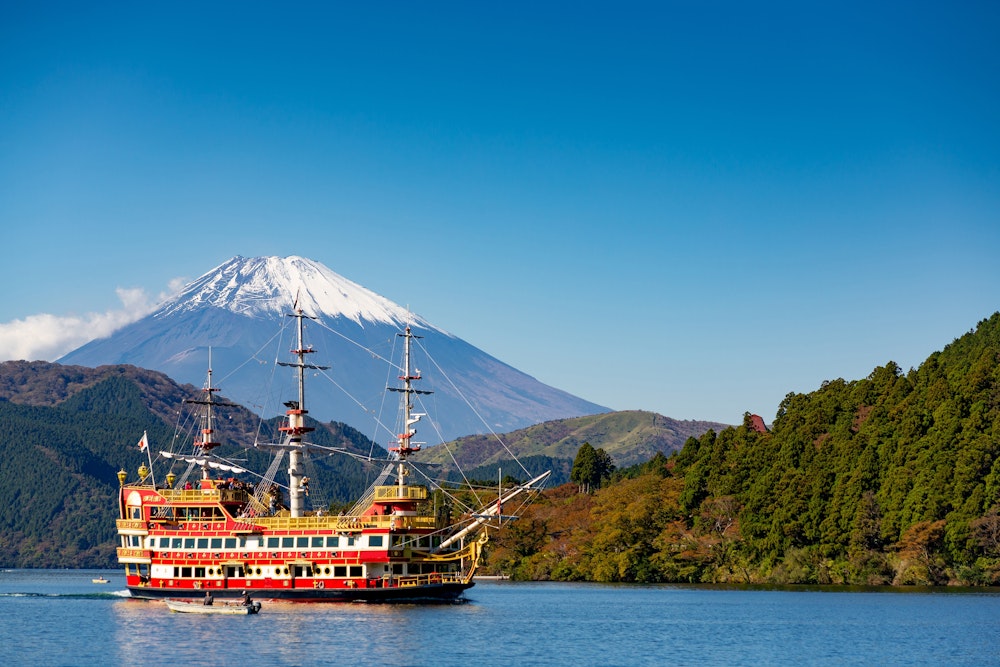 Boat cruise on Lake Ashi with Mount Fuji on the horizon