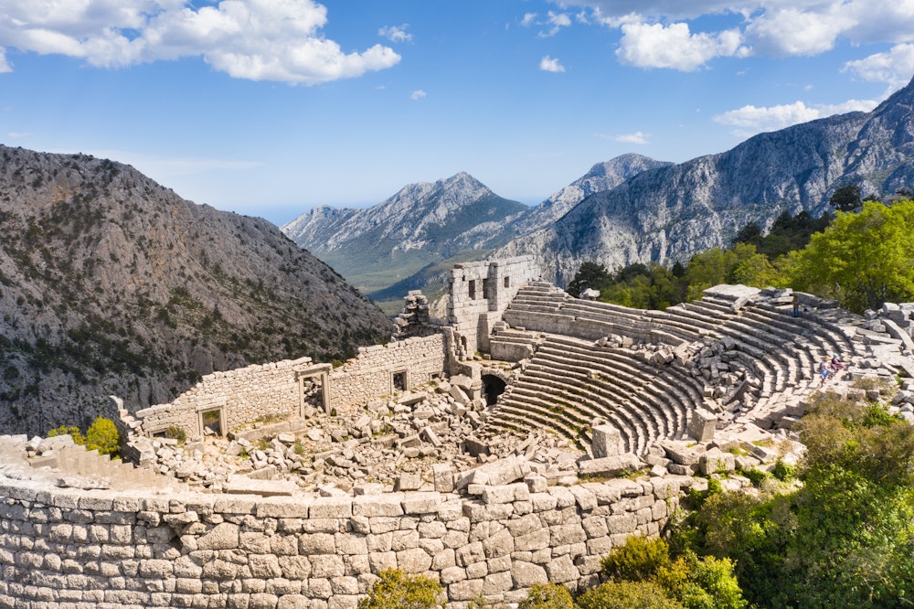 Termessos ruins of theatre surrounded by rugged mountain scenery