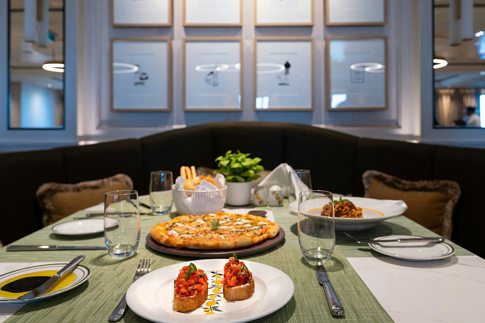 Dining table with food on AROYA cruise ship