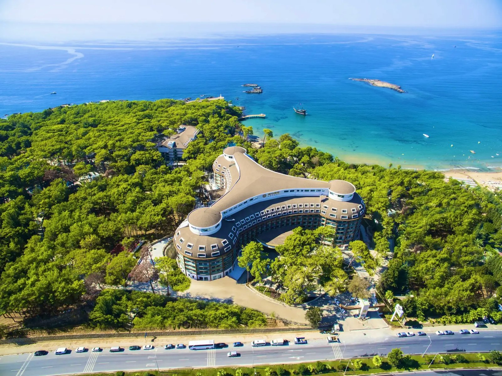 Set on a pine-covered peninsula in İncekum Nature Park, the resort has direct access to a sheltered, sandy bay.