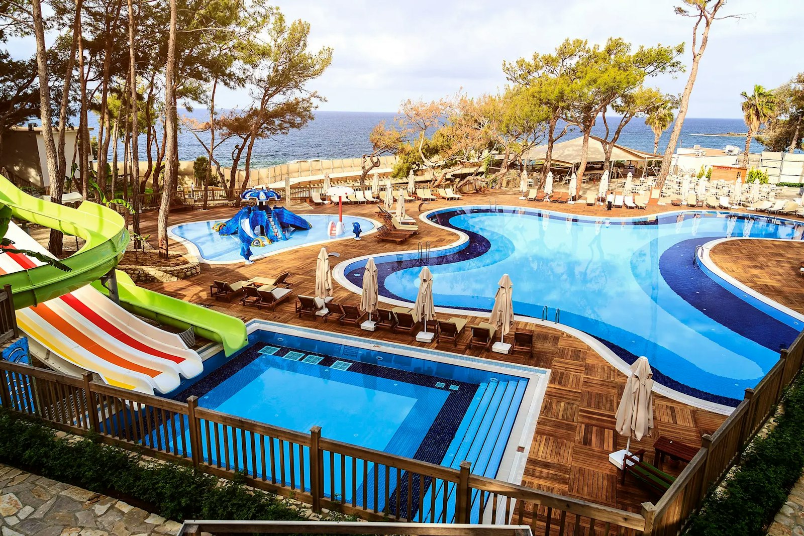 The mixed-gender pool area lets families enjoy the water and sun together.