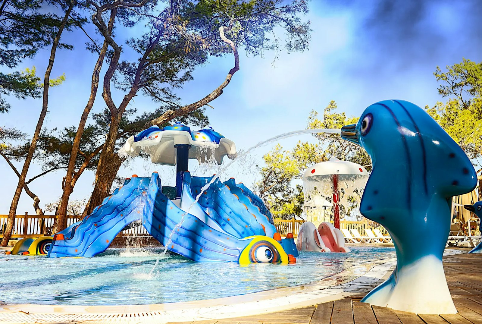 The children's splash pool and mini club keep younger guests entertained in a safe, shaded setting.