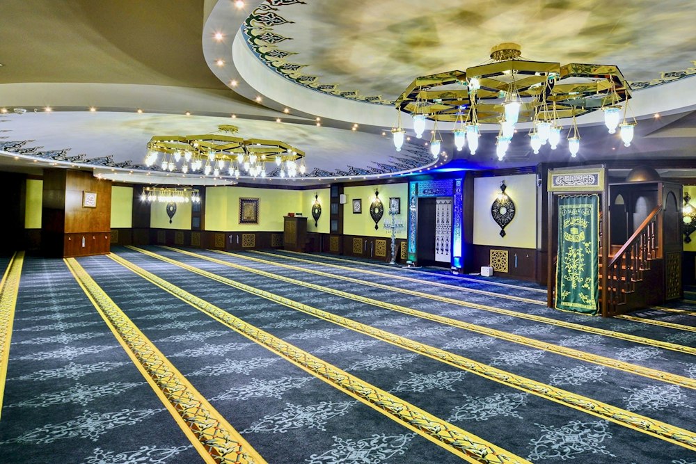 Carpeted prayer hall at Adenya Hotel & Resort