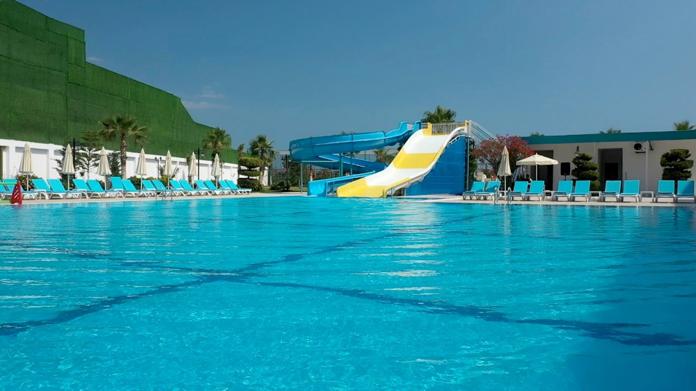 Large pool with a water slide at Rizom Beach Hotel Kumluca