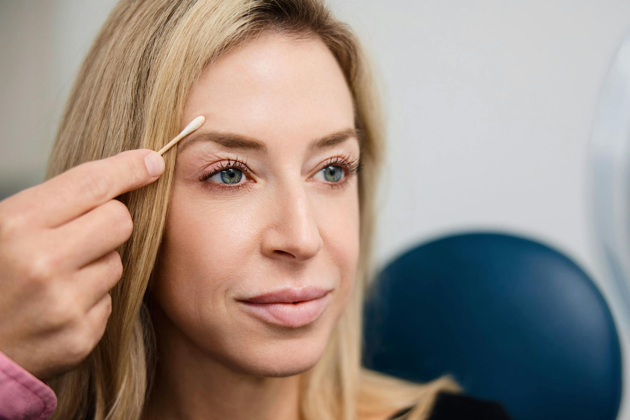 close up on woman getting her brow lifted