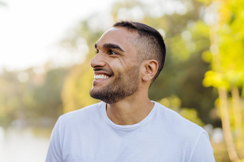 man with beard smiling