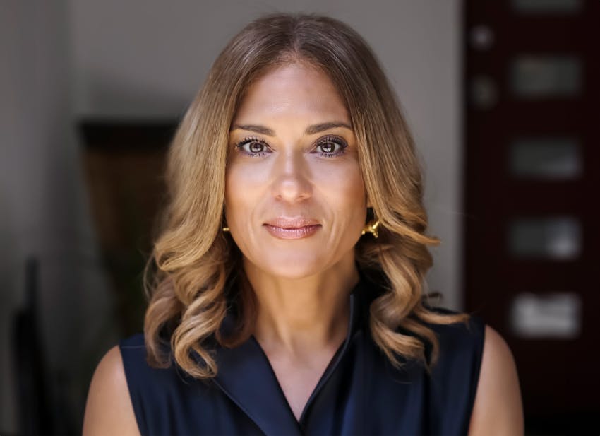 woman with a slight smile