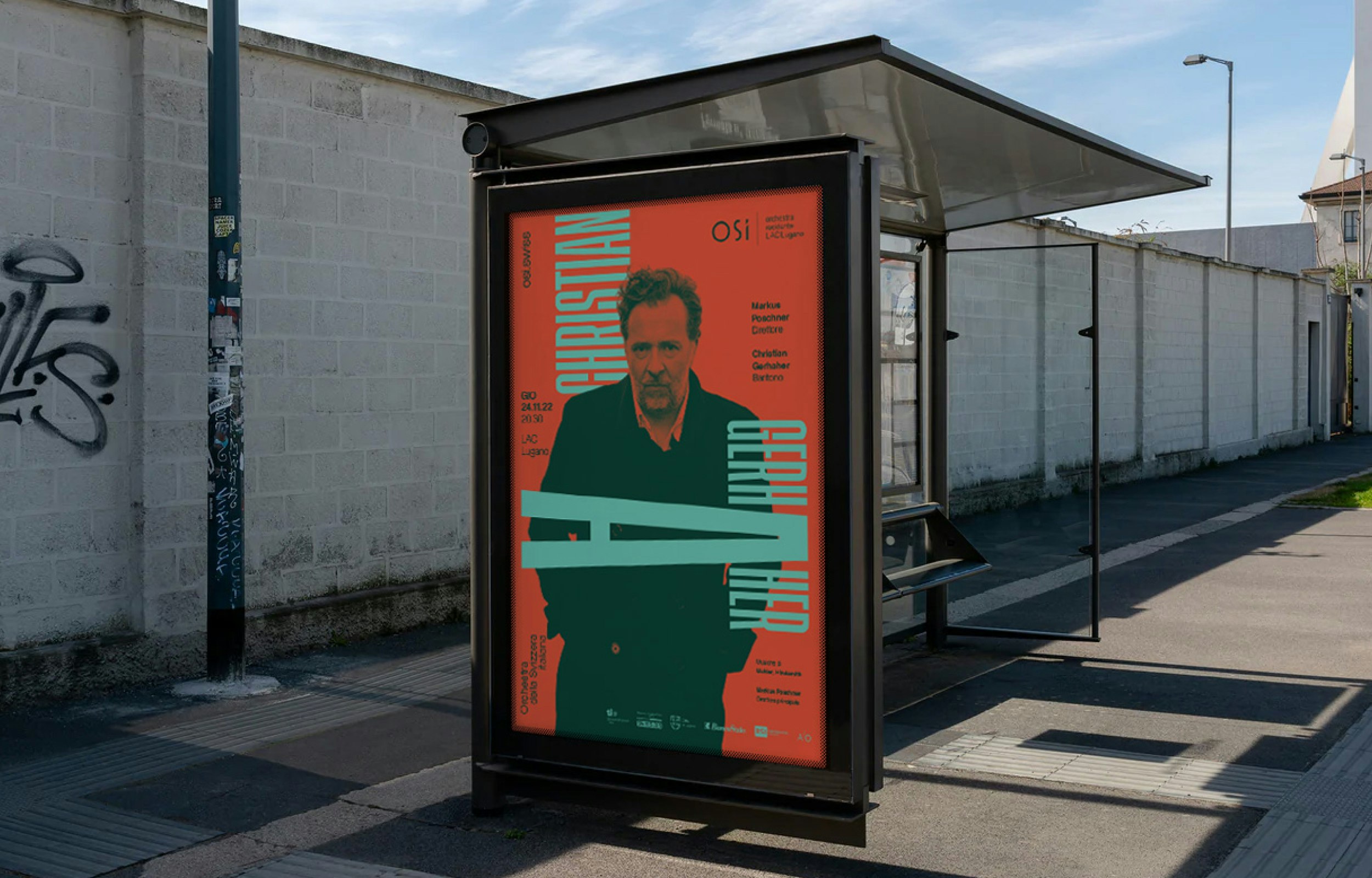 Poster with red background and turquoise accent, portrait of Christian Gerhaher and concert details.