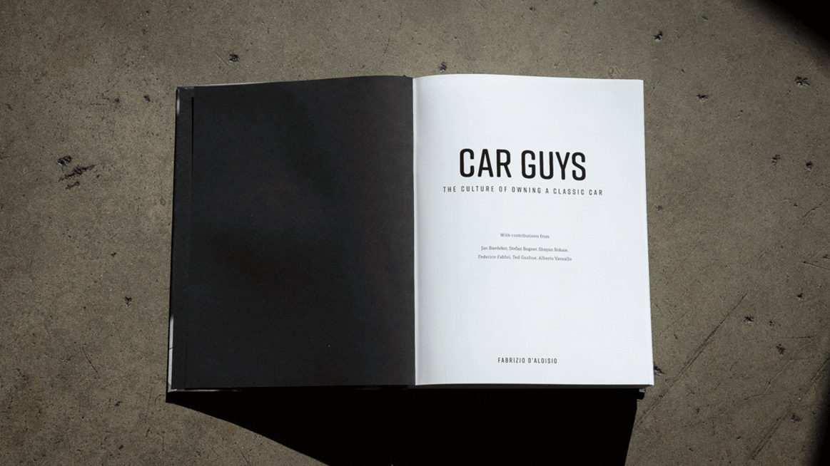 Animated title spread of the Car Guys book featuring a clean black-and-white design.