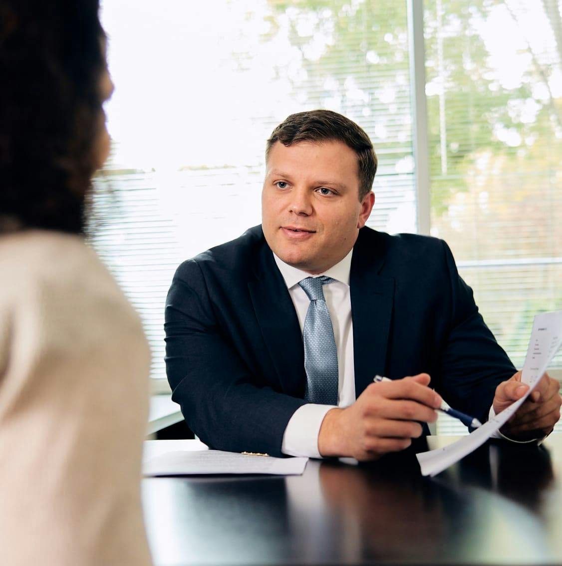 Attorney DuBose helping a client