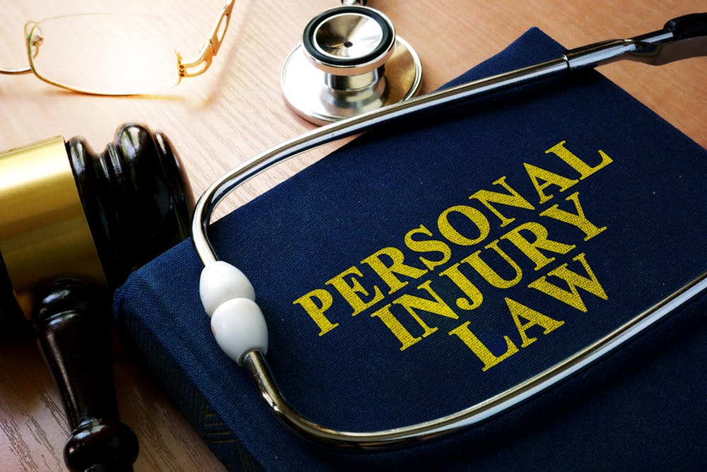 Personal Injury Law Stethoscope Over a Book Titled 'Personal Injury Law'