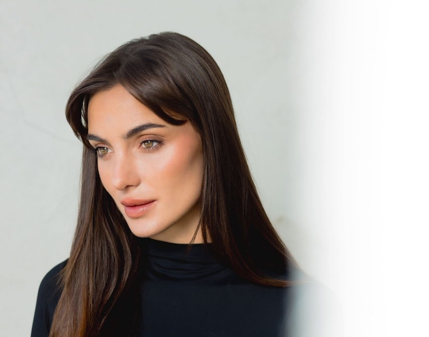 Brunette woman looking off camera