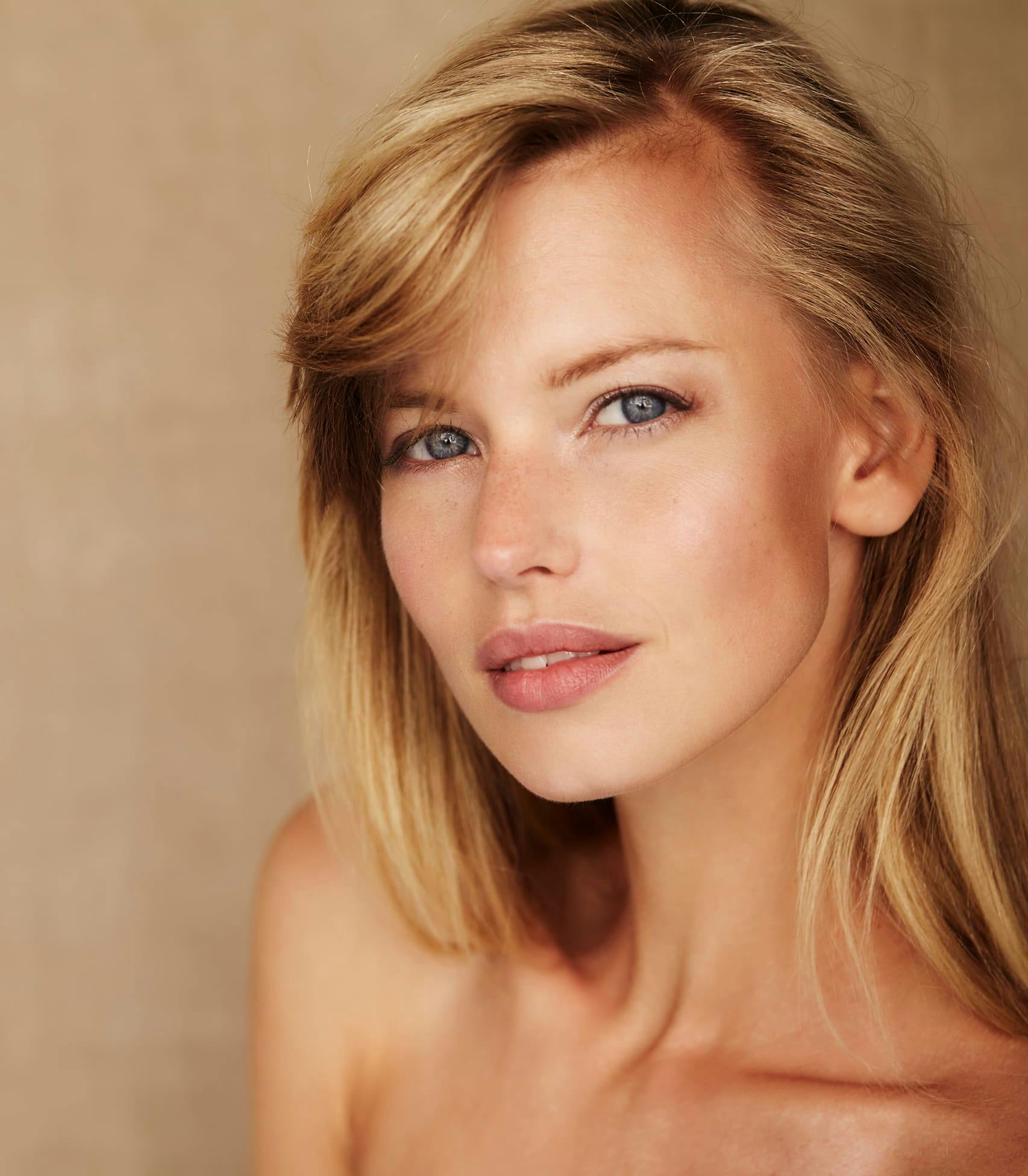 Blonde woman looking at camera