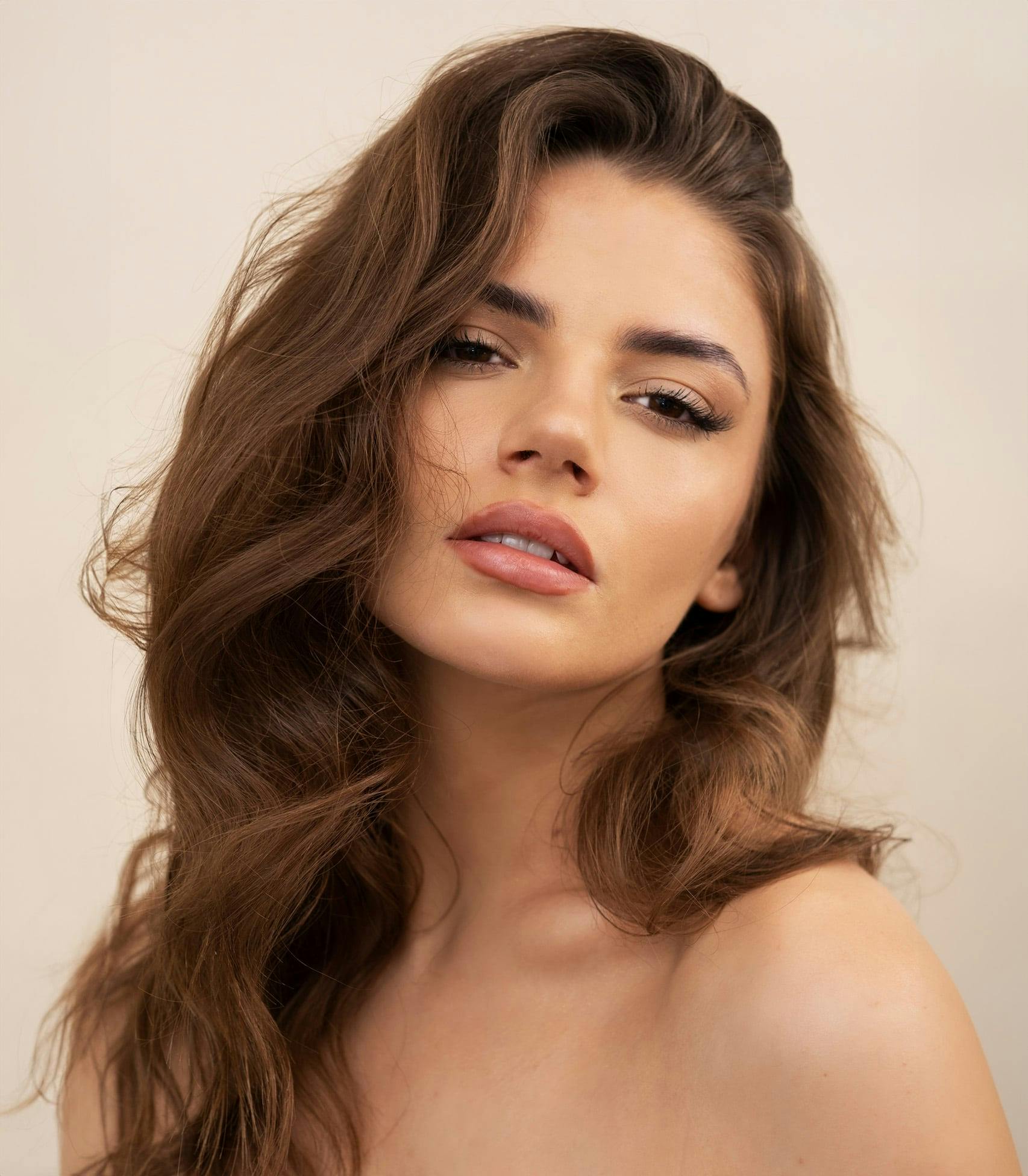 woman with wavy brown hair