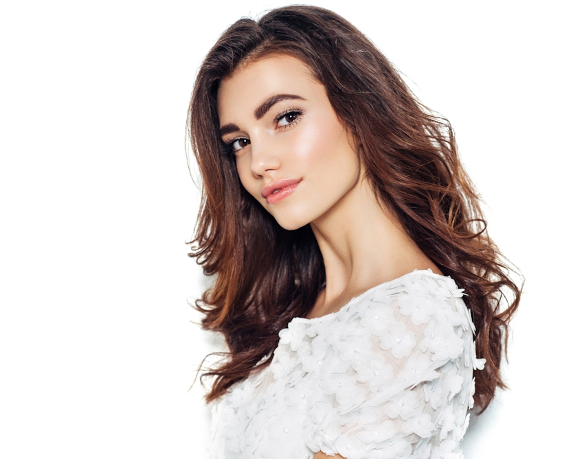 woman wearing a white shirt with flowers on it