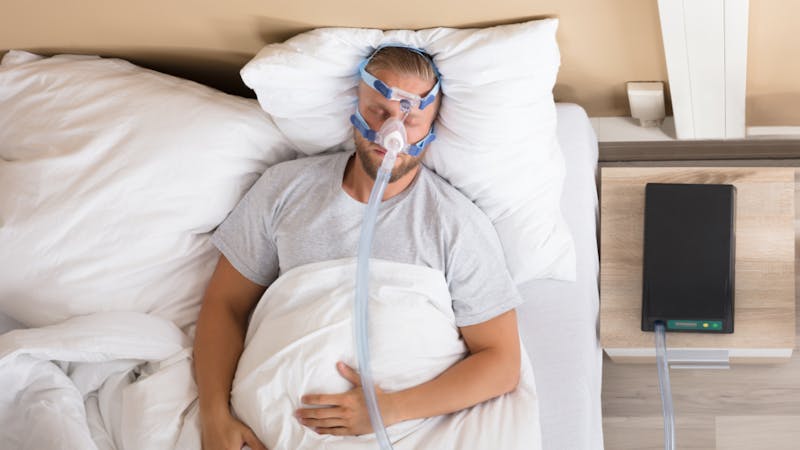 man using CPAP