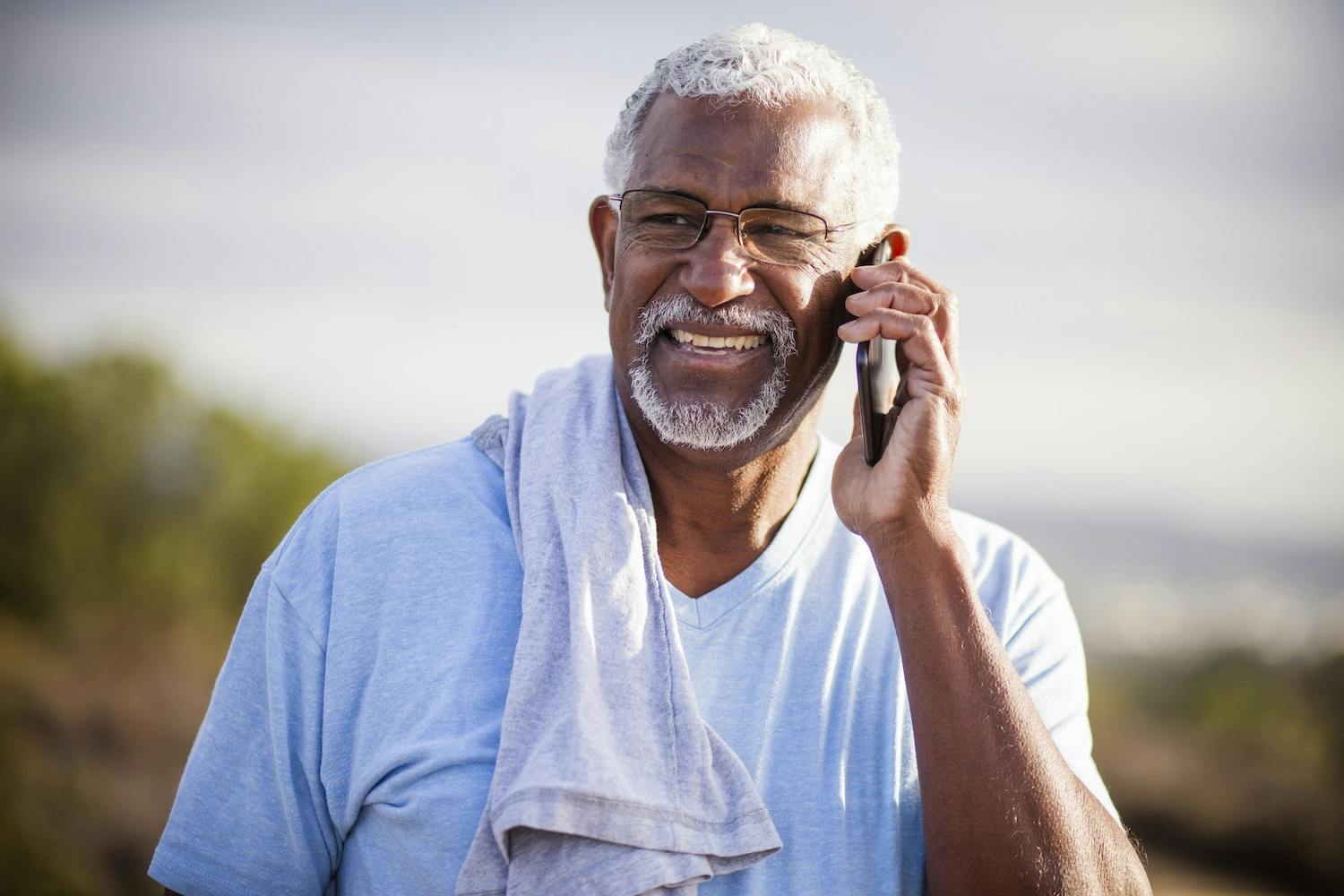senior man on mobile phone