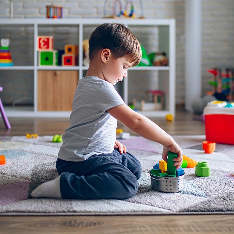 child playing with toys